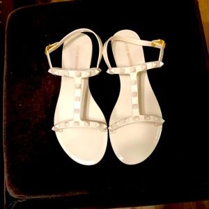 Steve Madden jelly sandals.